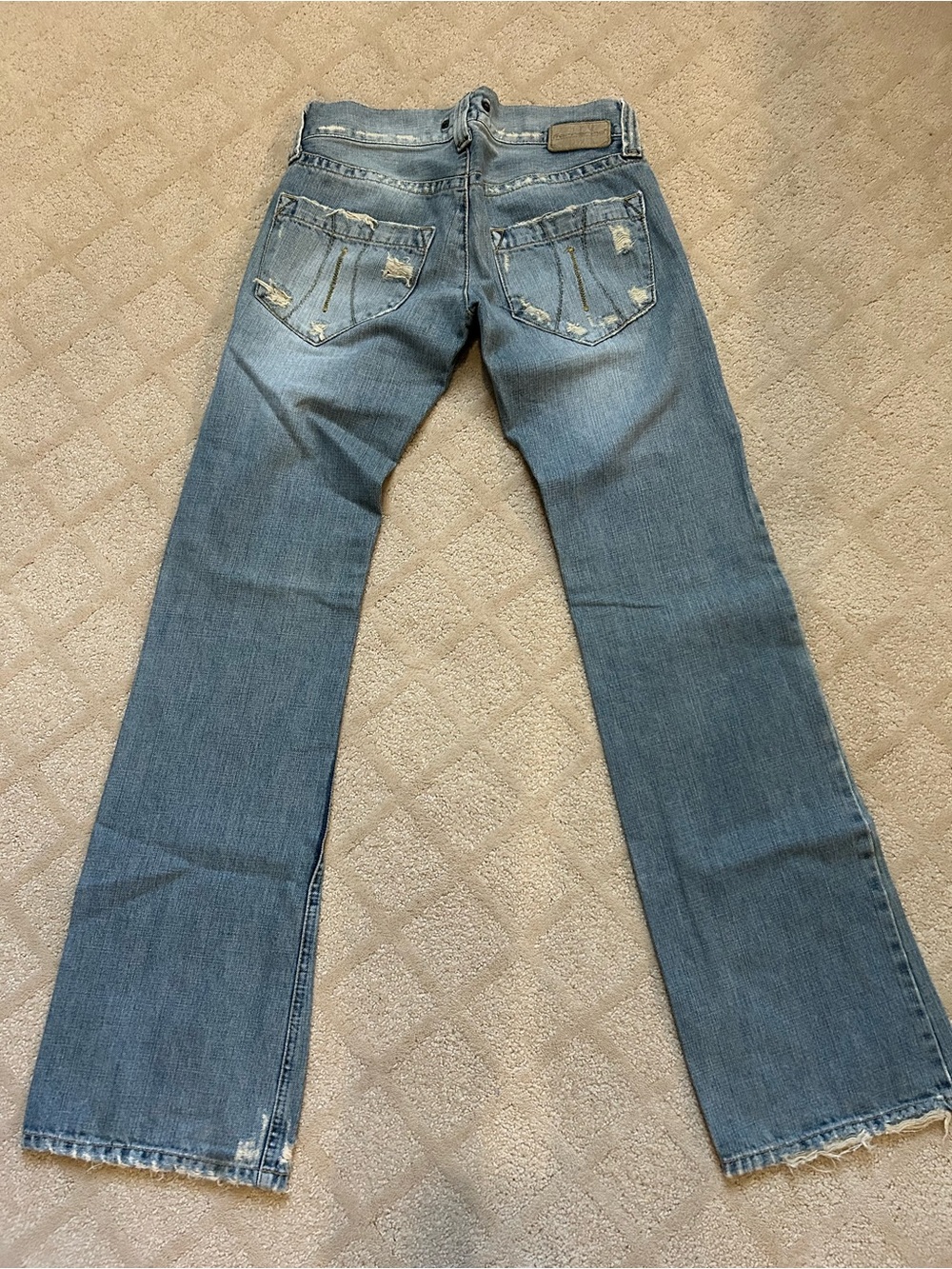Light Blue Distressed Boot Cut Jeans for Women